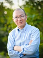 Wenguang Huang